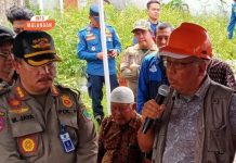 PENERTIBAN TEMBOK PEMBATAS DI PERUMAHAN GRIYA SHANTA KOTA MALANG DITUNDA, KETEGANGAN ANTARA WARGA DAN PETUGAS GABUNGAN